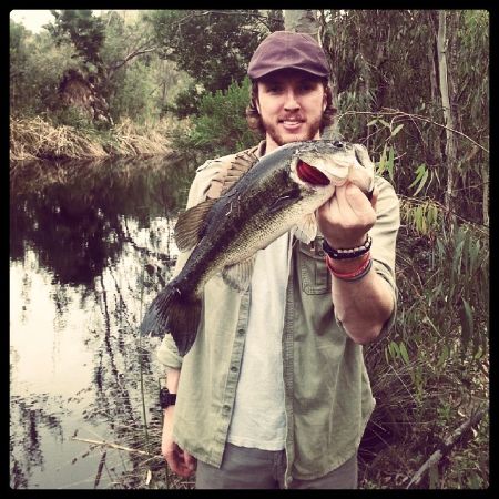 Beau Grayson Tucker took a picture with a bass he caught. 